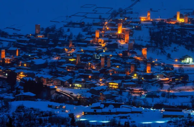 Ushguli village with towers and Mount Shkhara in the background